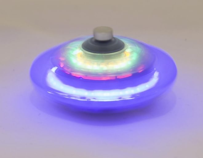 Light up spinning store top
